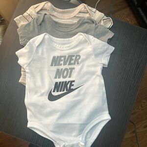 Nike onesie ( gentle used)